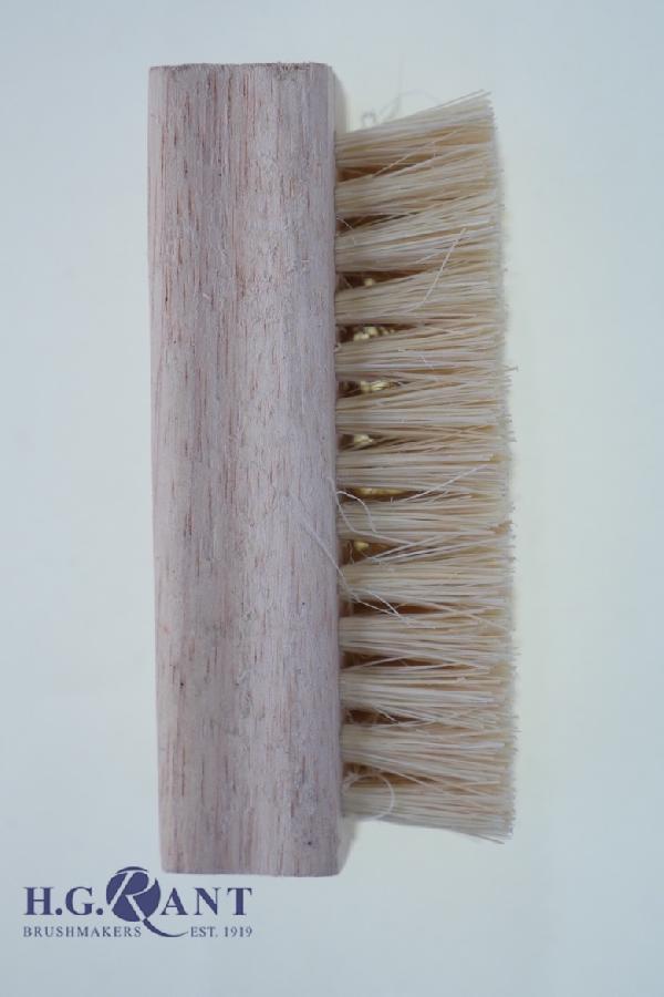 Fibre filled nail brush